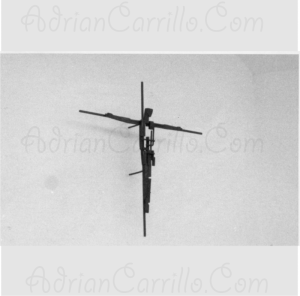 Enlace a obra religiosa. imagen de cristo en una cruz de metal